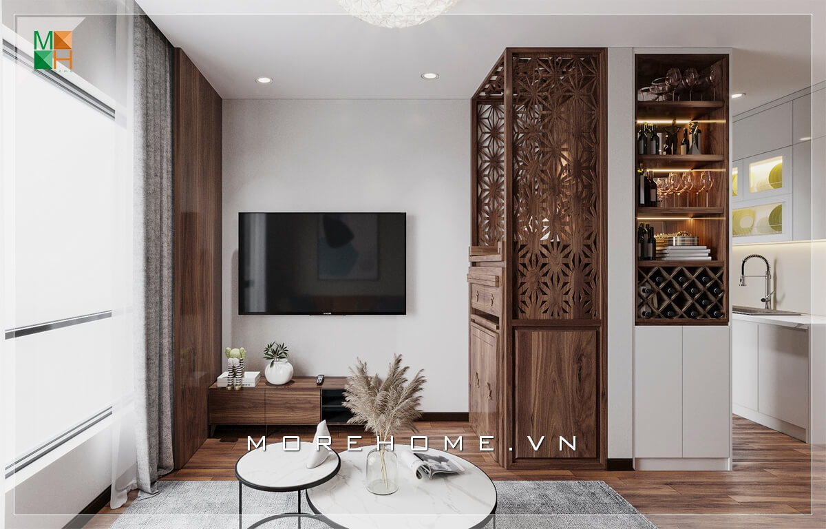 Mẫu kệ tivi gỗ tự nhiên tuy đơn giản nhưng cũng hết sức tinh tế và tiện nghi khiến căn phòng khách chung cư trở nên sang trọng hơn. Thiết kế phòng khách chung cư hiện đại