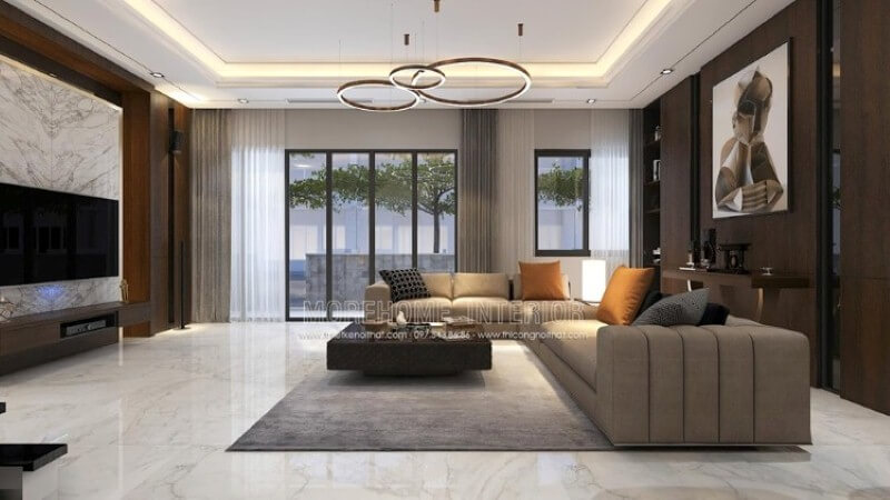 Bố trí nội thất phòng khách biệt thự rộng nổi bật với phong cách hiện đại nổi bật bộ sofa góc lớn cách điệu với đường kẻ sọc trang trí đẹp mắt. Ấn tượng các mẫu sofa phòng khách độc đáo nhất
