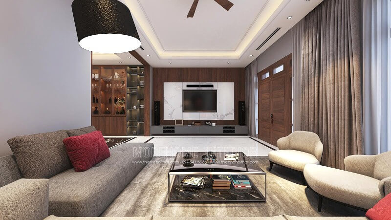 Đá trắng vân mây kết hợp gỗ ốp tường vân óc chó cao cấp tạo nên vẻ đẹp sang trọng đầy lôi cuốn cho phòng khách hiện đại. Thiết kế gỗ ốp tường phòng khách đep